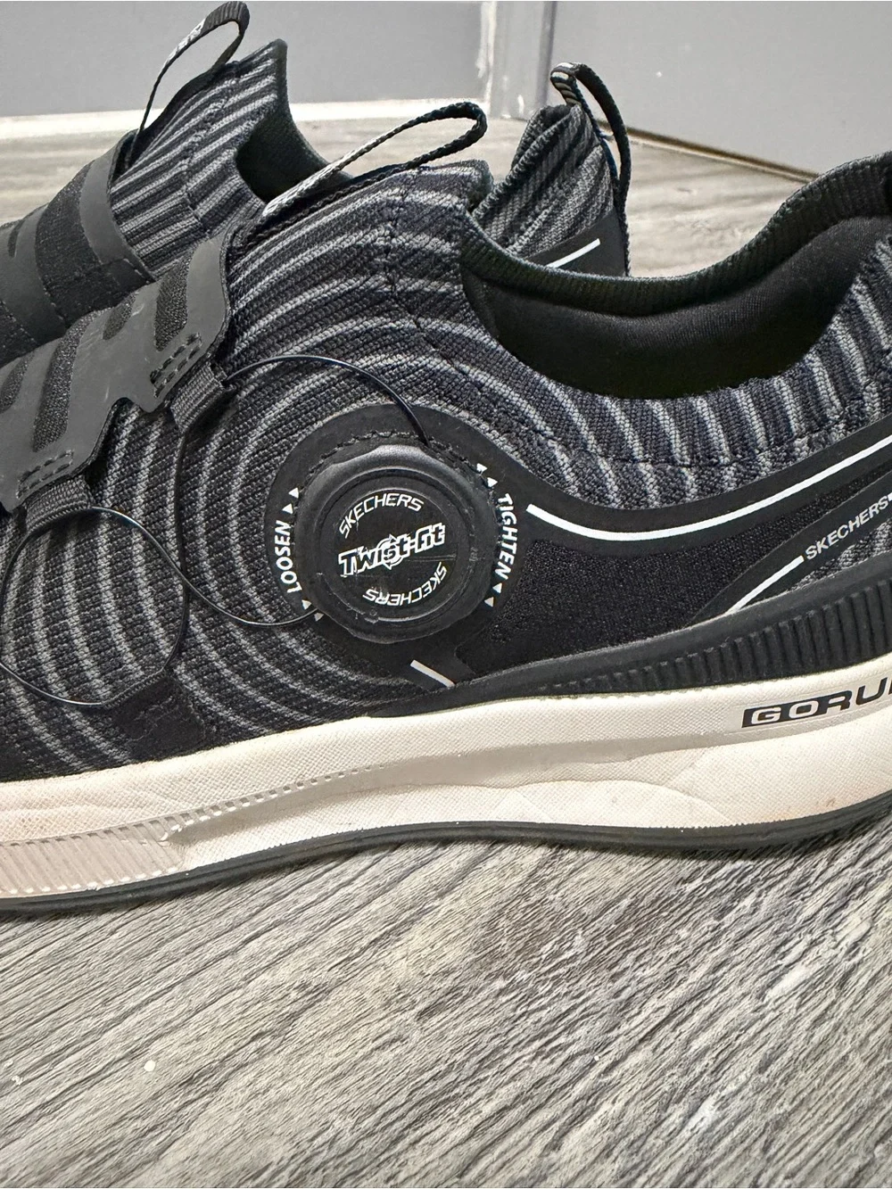 Skechers Black and White Slip-On Knit Sneakers